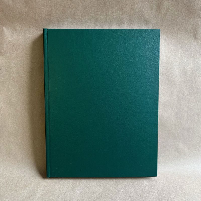 Green hard cover laboratory notebook lined pages