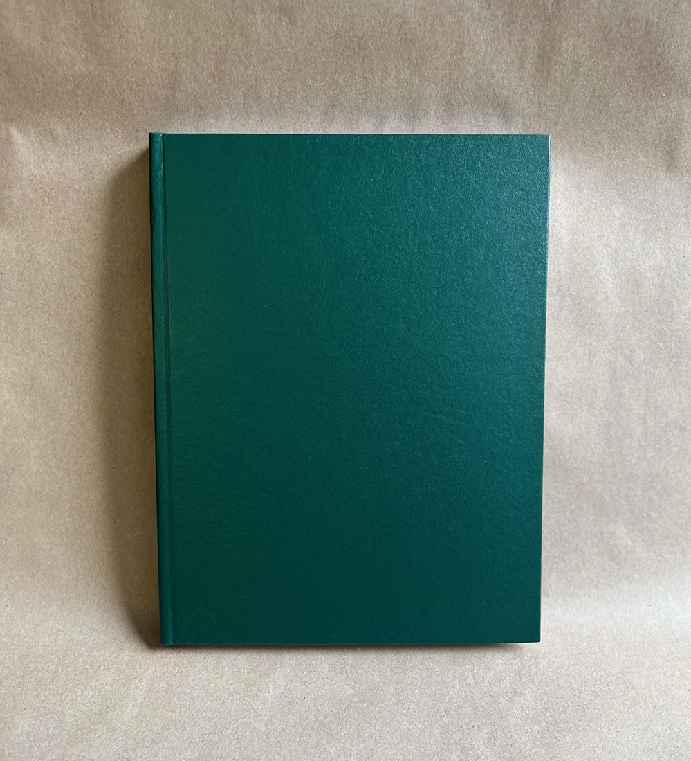 Green hard cover laboratory notebook lined pages