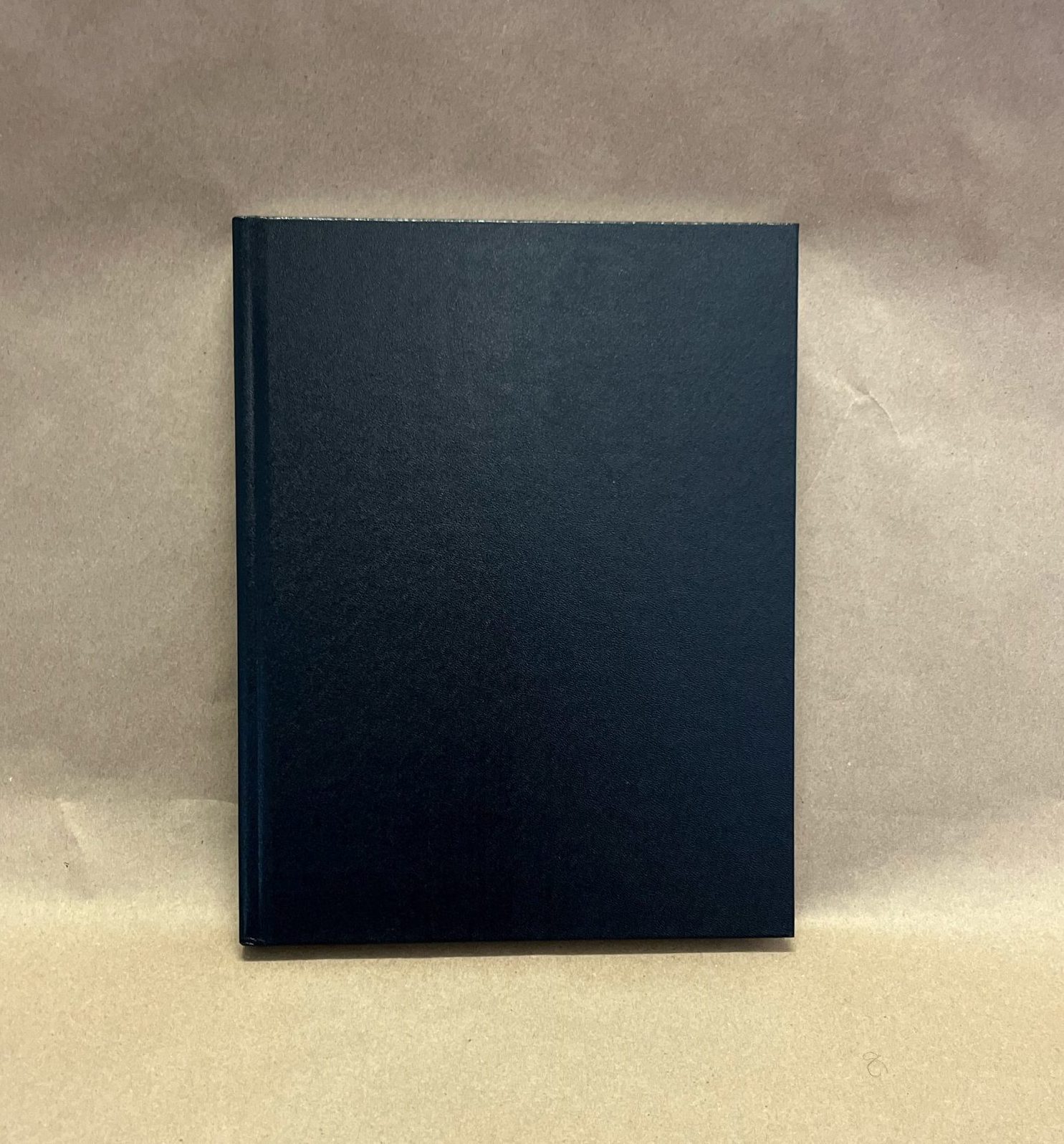 Black bound laboratory notebook